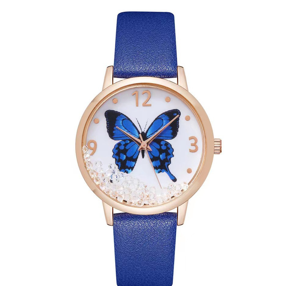 Women's quartz watch with a modern design, unique numerals, rhinestones, and butterfly accents for a chic finish (Blue)