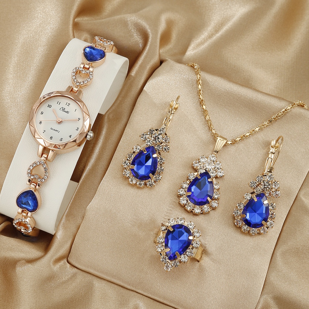 A luxurious women's watch with a simple design, featuring quartz movement and an elegant jewelry-like bracelet (Blue Set)