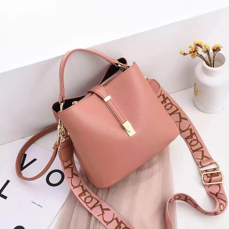 Choose this unique women's bag that skillfully blends the allure of elegance with practicality  (Pink)