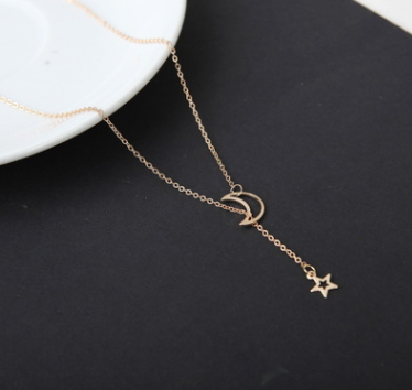 A short necklace with a chain featuring an attractive moon and star design, perfect for adding an elegant touch to your look  (Gold)