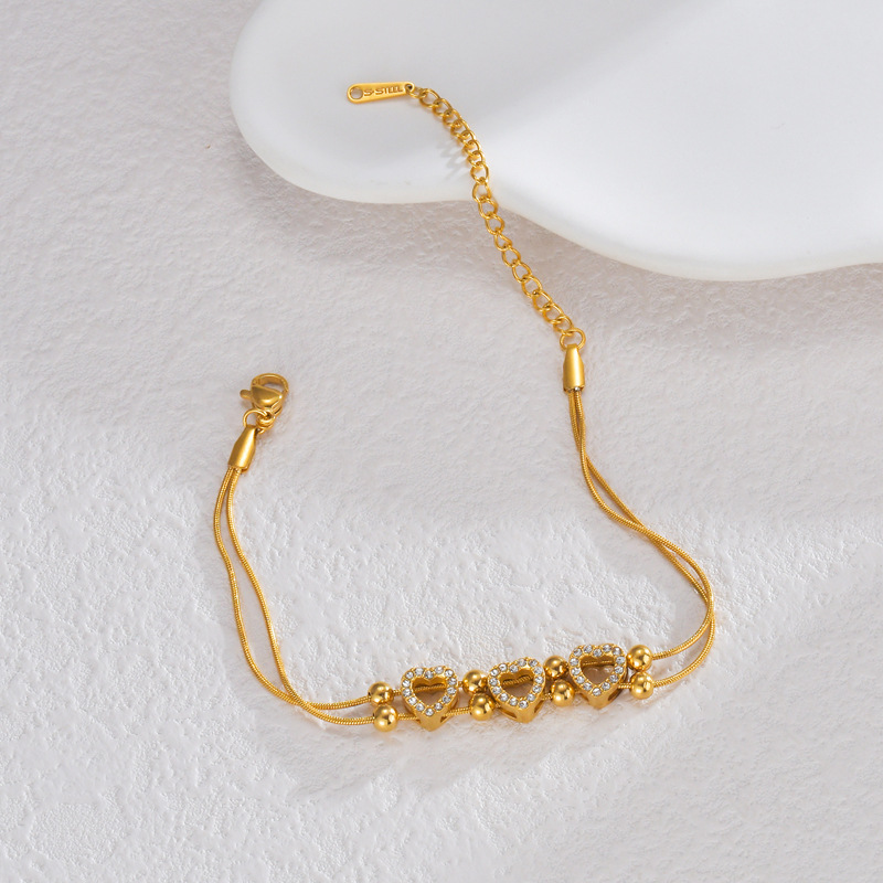 Elegant stainless steel bracelet plated with 18K gold (1)